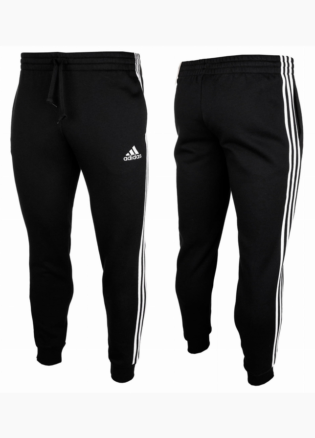 adidas Pánské kalhoty Essentials Tapered Cuff 3 Stripes GK8831 EUR M OUTLET adidas Pánské kalhoty Essentials Tapered Cuff 3 Stripes GK8831 EUR M OUTLET