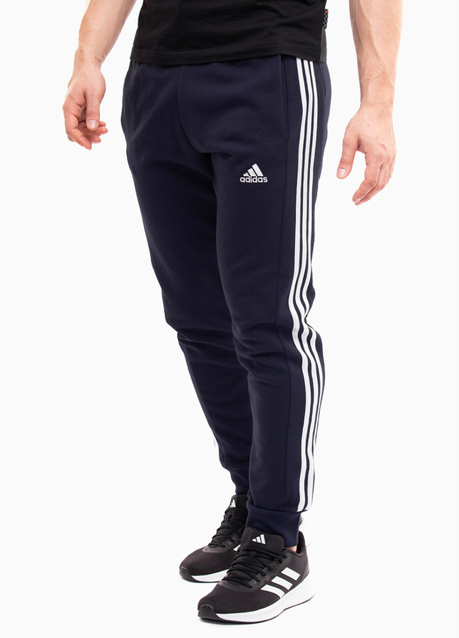 adidas Pánské tepláky Essentials French Terry Tapered Cuff 3-Stripes IC9406 adidas Pánské tepláky Essentials French Terry Tapered Cuff 3-Stripes IC9406
