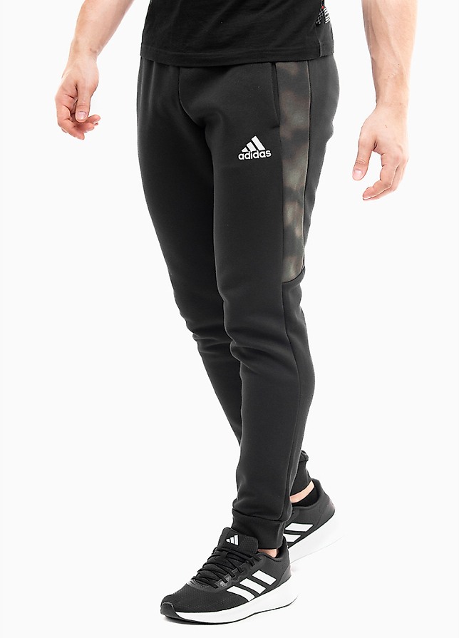 adidas Pánské kalhoty Essentials Camo Print Fleece Pants HL6929 adidas Pánské kalhoty Essentials Camo Print Fleece Pants HL6929