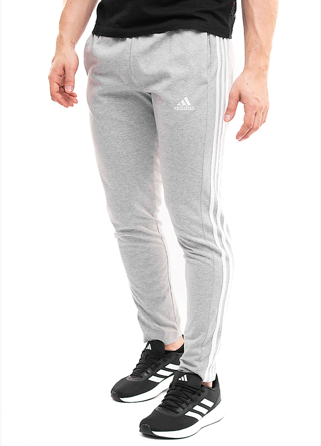 adidas Pánské tepláky Essentials Single Jersey Tapered Open Hem 3-Stripes IC0046 adidas Pánské tepláky Essentials Single Jersey Tapered Open Hem 3-Stripes IC0046