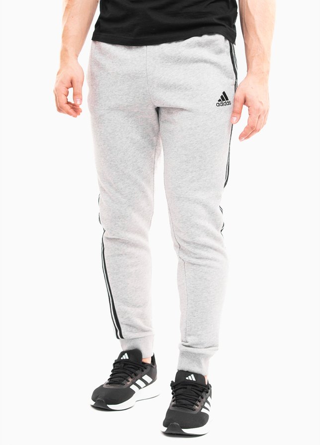 adidas Kalhoty Teplákové Pánské Essentials Tapered Cuff 3 Stripes GK8889 adidas Kalhoty Teplákové Pánské Essentials Tapered Cuff 3 Stripes GK8889