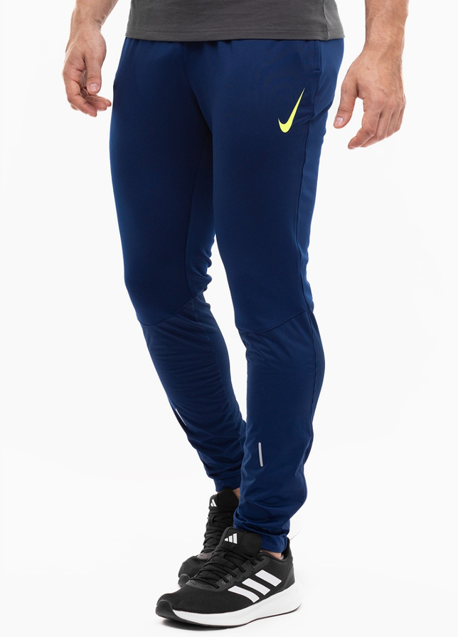 Nike Pánské kalhoty Therma-Fit Strike Pant Kwpz Winter Warrior DC9159 492 Nike Pánské kalhoty Therma-Fit Strike Pant Kwpz Winter Warrior DC9159 492